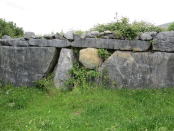 wall with a granite erratic